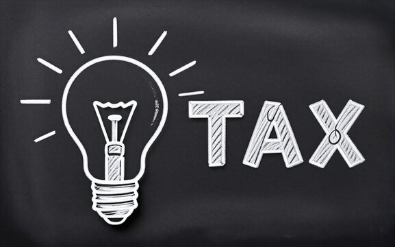 Chalkboard shows light bulb and "TAX" symbolizing ideas about