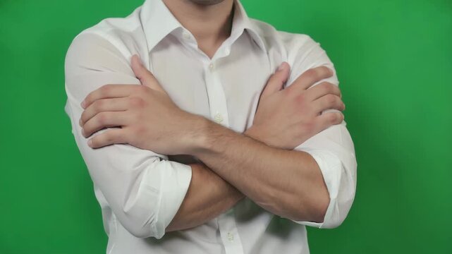 young man exercising  Arms cross smoothly