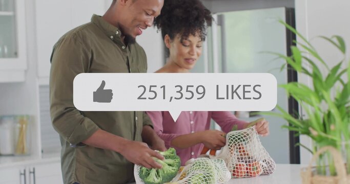 Couple packing broccoli carrots in mesh bags at kitchen island with thumbsup overlay 251,359 LIKES