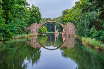 Tableau sur plexiglas Le Rakotzbrücke Rakotz Bridge at sunset (Rakotzbrucke, Devil's Bridge) in Kromlau, Saxony, Germany  © Pawel Pajor