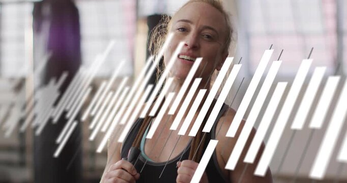 Woman holding rope handles, gym, animated white bar sweeping revealing face while preparing set