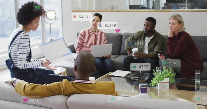 Presenter flipping binder in marketing, sparking likes and follower counters swelling around team