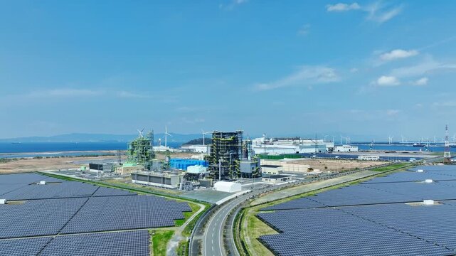 Aerial view of industrial area and mega solar power plant