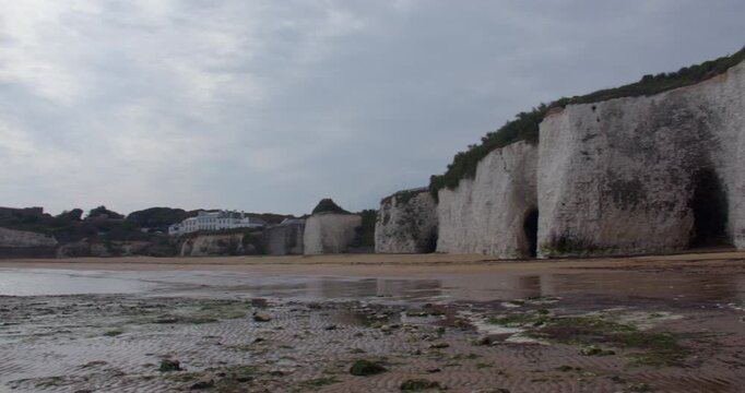 Extra wide shot looking north up Kingsgate bay beach