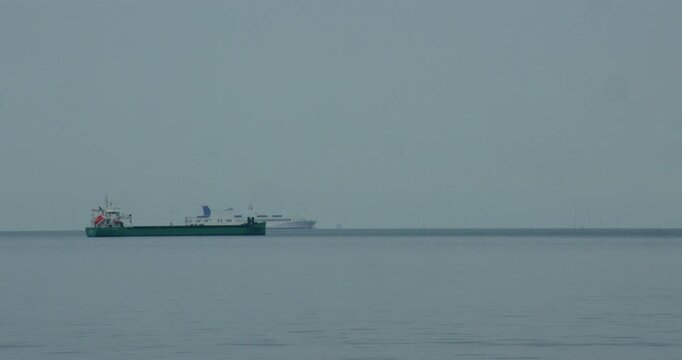 Shot of a ferry overtaking a tanker on the English Channel at Margate