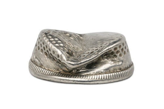 Damaged antique silver thimble losing original form
