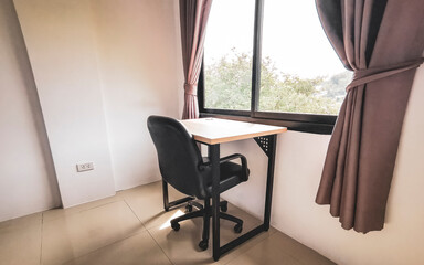 Fototapeta premium Simple white cheap apartment hotel room in Patong Phuket Thailand.