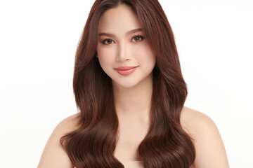 Naklejka premium A beautiful young Asian woman with clean, fresh skin against a white background. Skincare, facial treatment, cosmetology, beauty, and spa. An elegant portrait of an Asian woman.