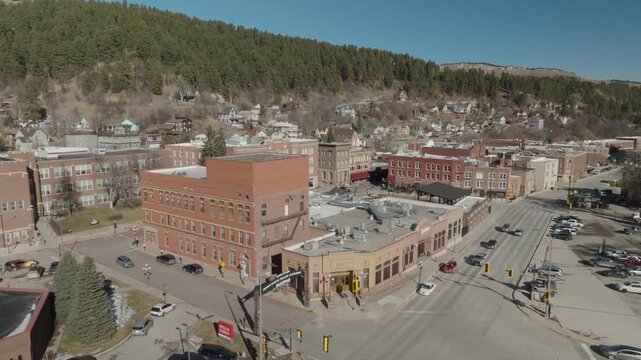 A drone shot panning up and tilting down above Deadwood, South Dakota