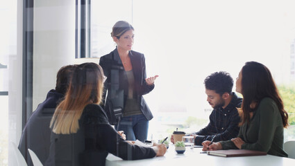 Business people, training and presentation with woman in office for meeting, discussion and...