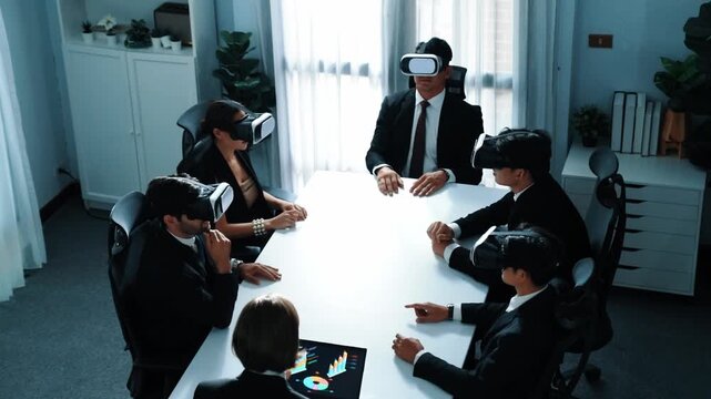 Top view of project manager working on laptop and sending data analysis to business people by using VR glass headset. Professional marketing team enter metadata or virtual world program. Directorate.