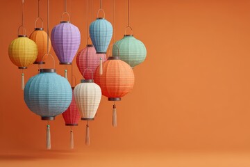 Fototapeta premium Colorful paper lanterns in various shapes and sizes hanging against a vibrant orange background, showcasing intricate designs and tassels for decorative purposes