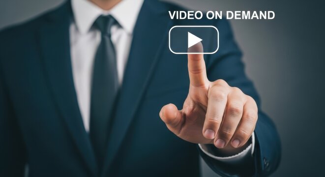 Hand Touching Play Button for Video on Demand
