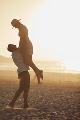 Smile, man and lifting woman at beach for travel, adventure and playful interaction on holiday....