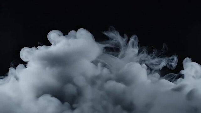 Dense white smoke billowing against dark background creates dramatic misty atmosphere, perfect for mysterious or atmospheric design projects