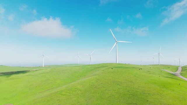 Drone view over Altamont Pass Wind Farm turbines in the California hills near Dublin. Applicable to energy, sustainability, and California landscape aerial content.