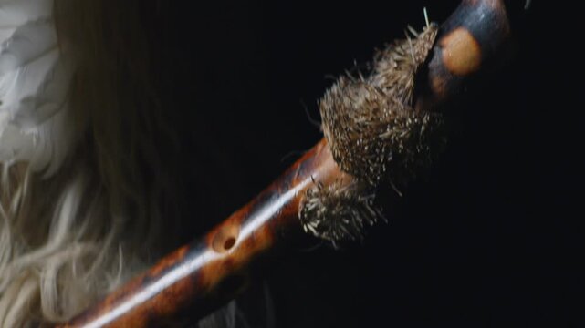 Close up of traditional wooden staff used by Kurent performers during Pust carnival Slovenia