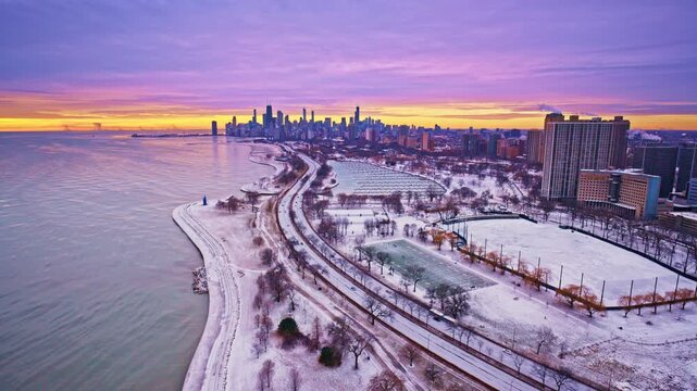 Drone view of the Loop district at dawn on a chilly winter morning.
