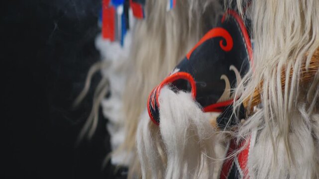 Close up of traditional Kurent carnival mask and fur costume during Pust festival in Slovenia