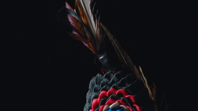 Close up of colorful Kurent mask ornament during traditional Pust carnival festival in Slovenia