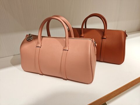 Paris,France-Oct.6th 2025: Longchamp Daylong leather bowling bags on store shelf