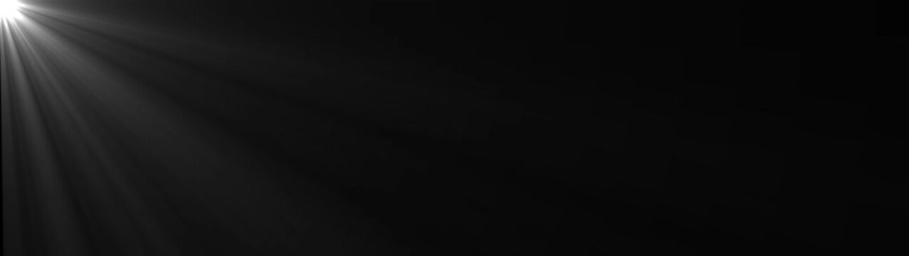 Abstract shimmering white light rays burst and rotate slowly, creating dynamic optical flare effect on a completely dark background. Sun rays effect footage overlay.