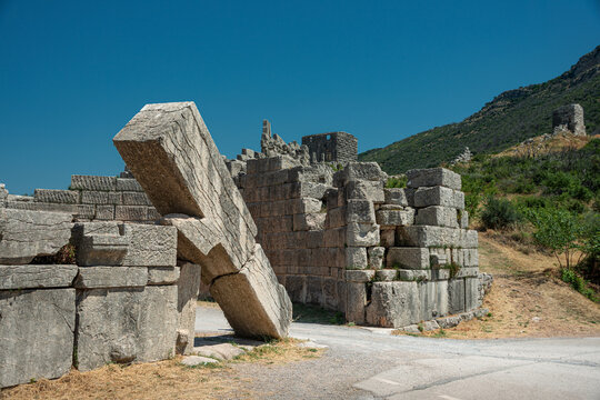 Ancient stone ruins of the Arcadia Gate at Messene archaeological site in Greece 