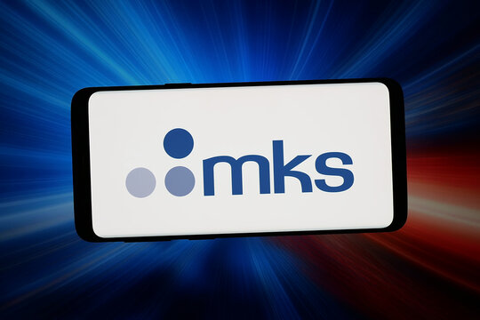 Stuttgart, Germany - 03-06-2026: In this photo illustration, the logo of US semiconductor instruments company MKS Inc. is displayed on a smartphone in front of abstract background on computer screen.