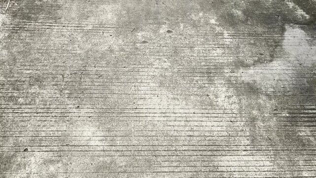 Rough concrete texture background with horizontal grooved patterns