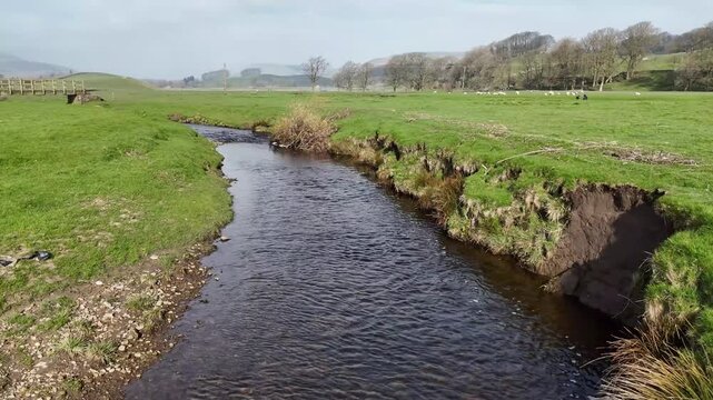 
Aerial view over the River Ure in Hawes from a drone 4K video
