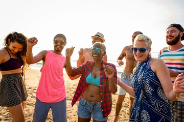 Joyful friends celebrating beach life.