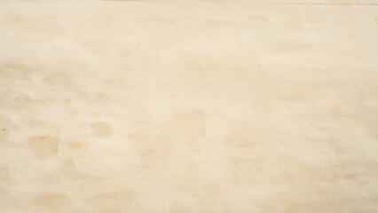 Obraz premium Old vintage paper texture background with aged stains and antique yellowed parchment effect