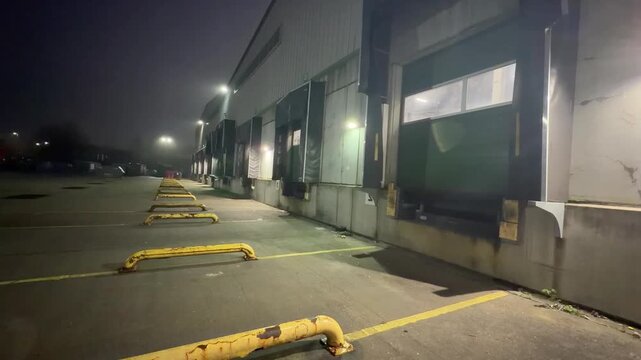 Empty warehouse loading area at night