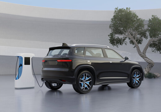 Rear view of Black Electric SUV charging at charging station. Monolithic design background. 3D illustration.