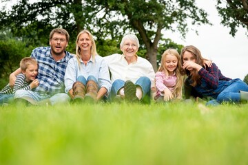 Fototapeta premium Happy family enjoying outdoor picnic.