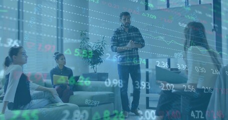 Presenting lead in shirt, jeans, gesturing to team at office meeting with display and stock overlay © vectorfusionart