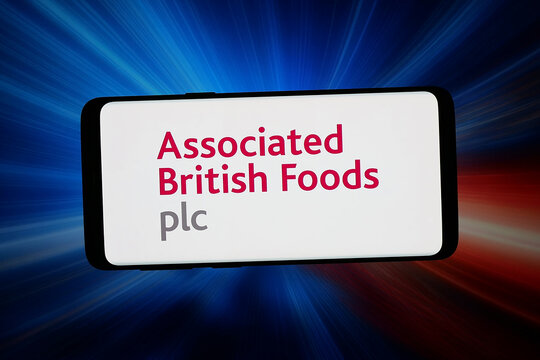 Stuttgart, Germany - 03-06-2026: In this photo illustration, the logo of company Associated British Foods plc (ABF) is displayed on a smartphone in front of abstract background on computer screen.