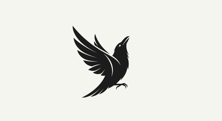 Obraz premium Elegant black bird in flight with spread wings, stylized raven or crow silhouette, minimalist graphic design element