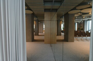 Naklejka premium Modern office interior with meeting space and columns