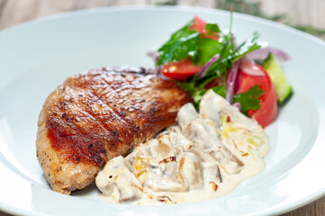 Grilled Chicken Breast with Creamy Mushroom Sauce and Fresh Salad