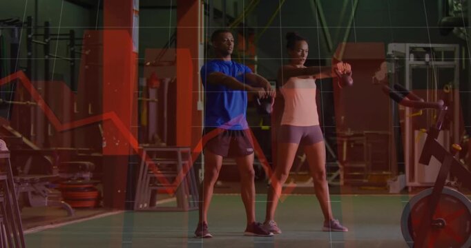 Man and woman doing kettlebell swings in gym, hip hinge starting swing, red overlay tracking motion