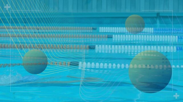 Male swimmer entering left, stroking across lane while spheres overlaying during swim training