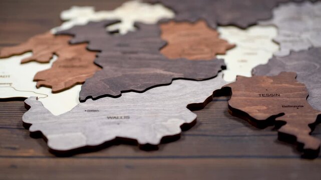 Wooden map of Switzerland world map made of wood as wall decoration. wall decorated with world map Switzerland wood puzzle.