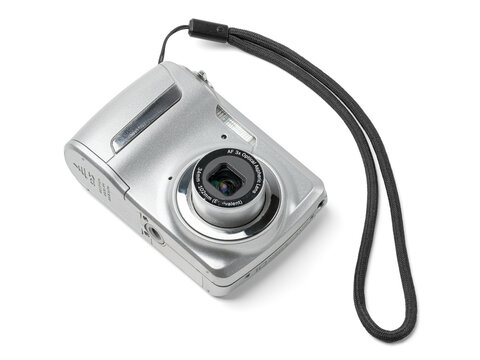 Vintage Silver Compact Point and Shoot Digital Camera, Early 2000s Retro Technology, Isolated on White Background	
