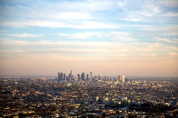 Expansive cityscape under vibrant sky.