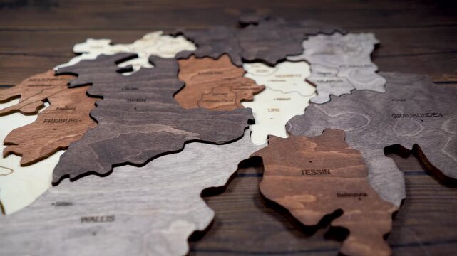 Wooden map of Switzerland world map made of wood as wall decoration. wall decorated with world map Switzerland wood puzzle.
