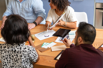 Collaborative meeting with diverse team.