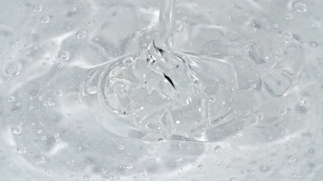 Transparent Gel Fluid, Serum, Oi Cosmetic With Molecule Bubbles. Macro Shot of Natural Organic Cosmetics, Medicine. Skin or Body Care Products. Advertising Background . High quality 4k footage