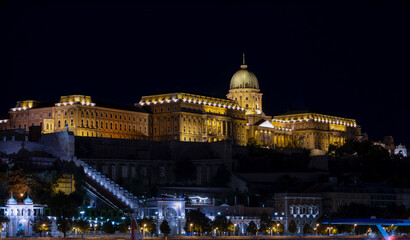 Fototapeta premium BUDAPEST, HUNGARY, JULY 21, 2024 - Buda castle in Budapest by night, Hungary, Europe