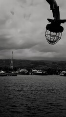 Fototapeta premium Moody Dockside Under Cloudy Skies